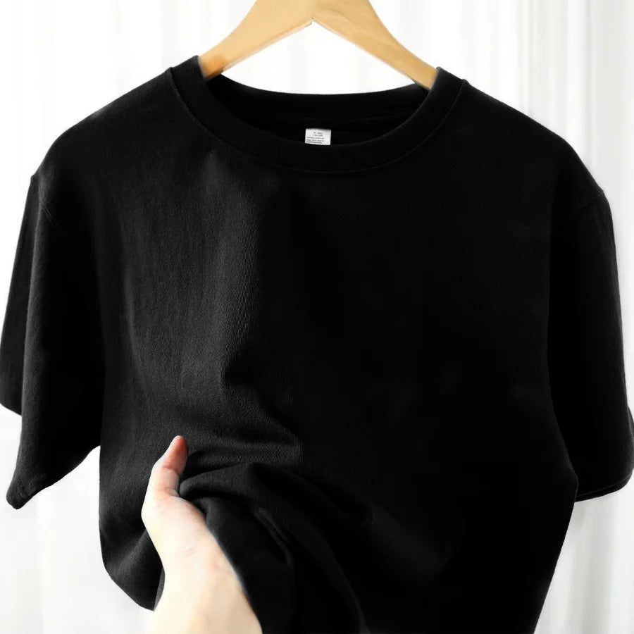Camiseta 100% algodón para hombre y mujer, color liso, cuello redondo, manga corta, camiseta coreana holgada de media manga, unisex, tallas M-4XL
