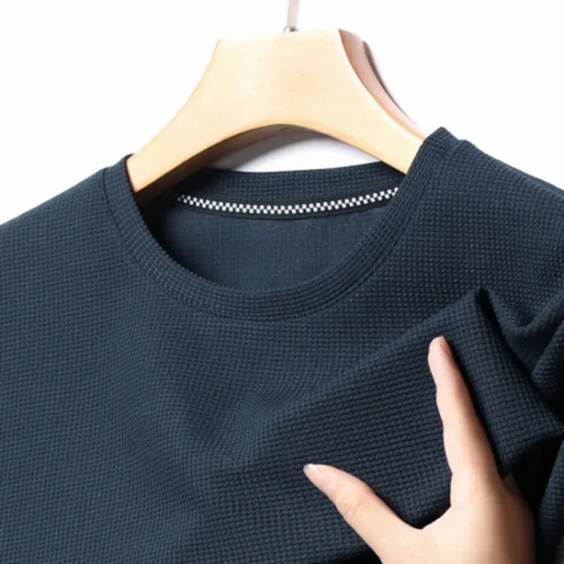Polo de manga corta. Polo liso tipo gofre de manga corta con cuello redondo para hombre, camiseta de algodón de manga corta para uso diario.