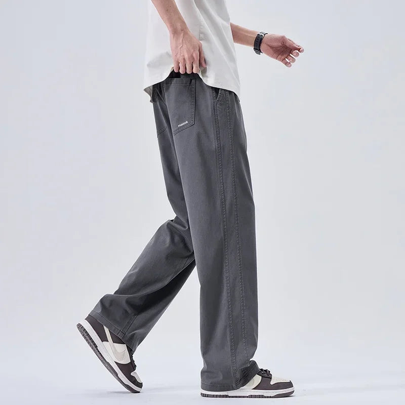 Pantalones vaqueros suaves de marca para hombre, de primavera, finos, drapeados, cómodos, rectos, con cordón, holgados, estilo urbano