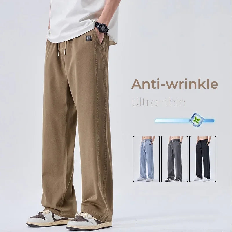 Pantalones vaqueros suaves de marca para hombre, de primavera, finos, drapeados, cómodos, rectos, con cordón, holgados, estilo urbano