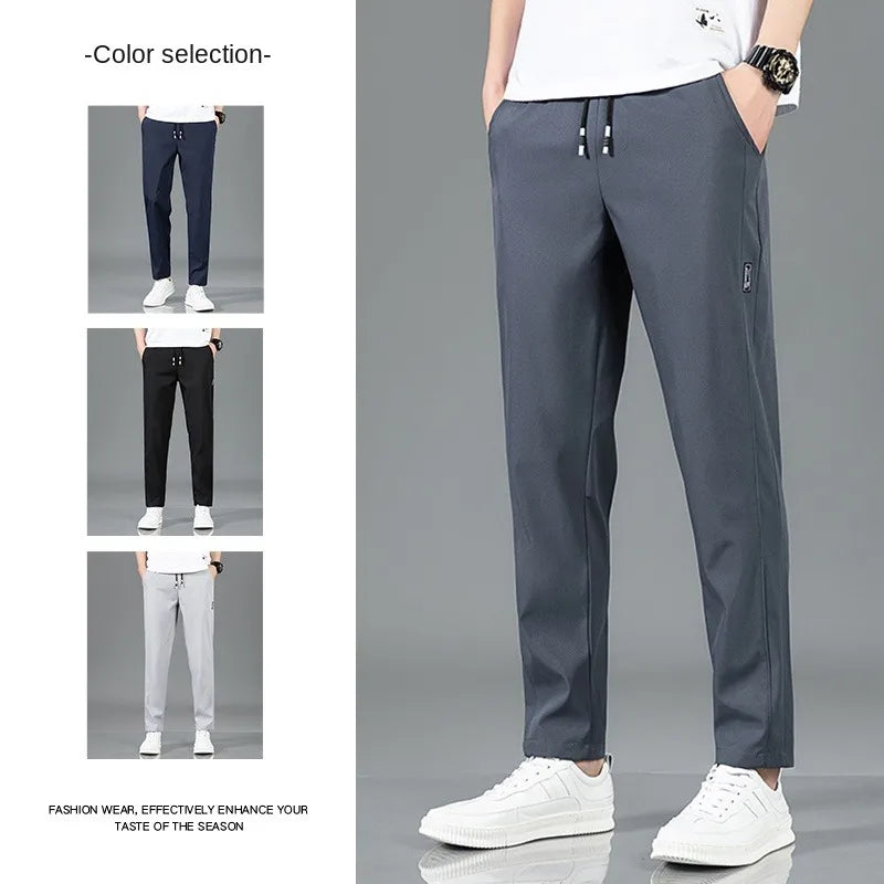 Pantalones de seda de hielo para hombre, novedad de verano 2025, negros, grises, finos, informales, de negocios, para exteriores, elásticos, transpirables, de pierna recta.