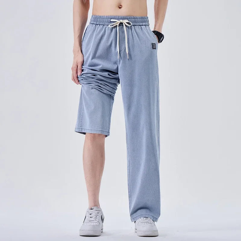 Pantalones vaqueros suaves de marca para hombre, de primavera, finos, drapeados, cómodos, rectos, con cordón, holgados, estilo urbano