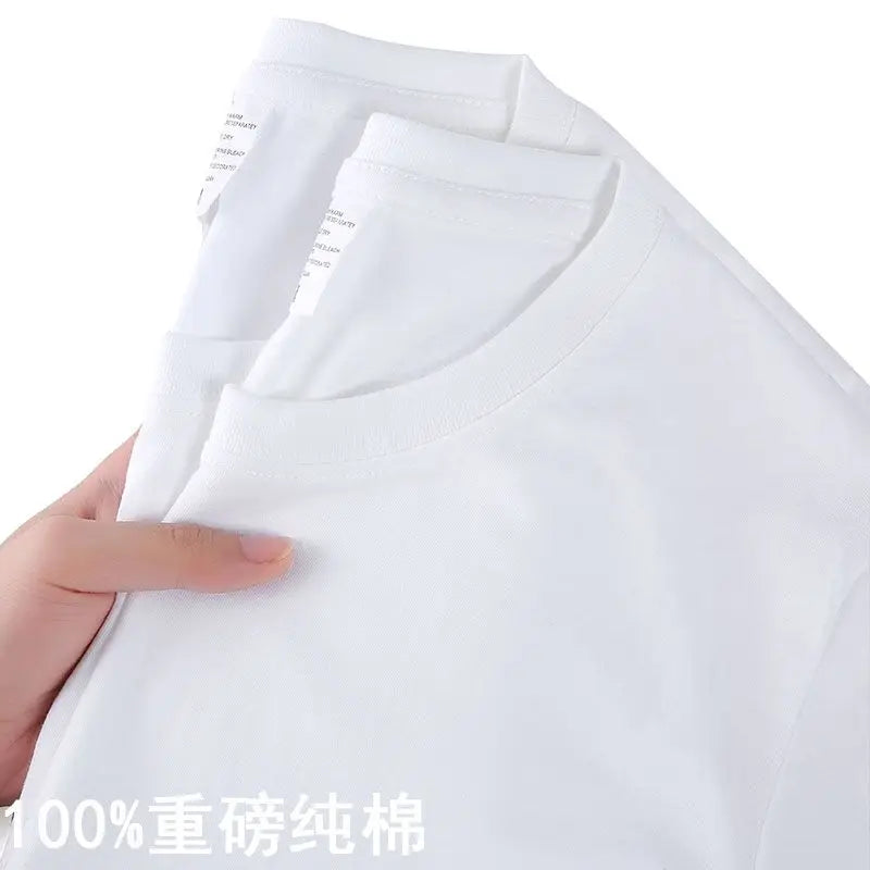 Camiseta 100% algodón para hombre y mujer, color liso, cuello redondo, manga corta, camiseta coreana holgada de media manga, unisex, tallas M-4XL