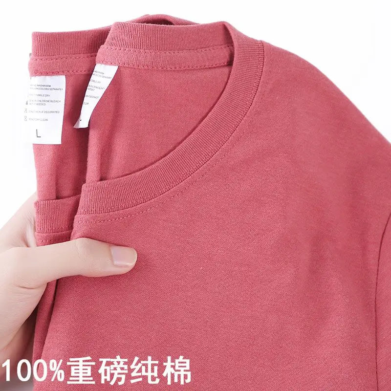 Camiseta 100% algodón para hombre y mujer, color liso, cuello redondo, manga corta, camiseta coreana holgada de media manga, unisex, tallas M-4XL