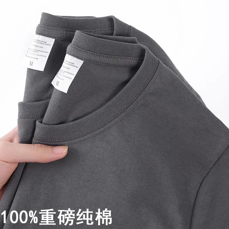 Camiseta 100% algodón para hombre y mujer, color liso, cuello redondo, manga corta, camiseta coreana holgada de media manga, unisex, tallas M-4XL