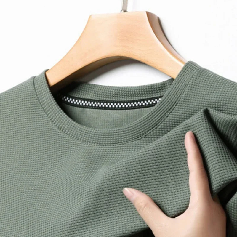 Polo de manga corta. Polo liso tipo gofre de manga corta con cuello redondo para hombre, camiseta de algodón de manga corta para uso diario.