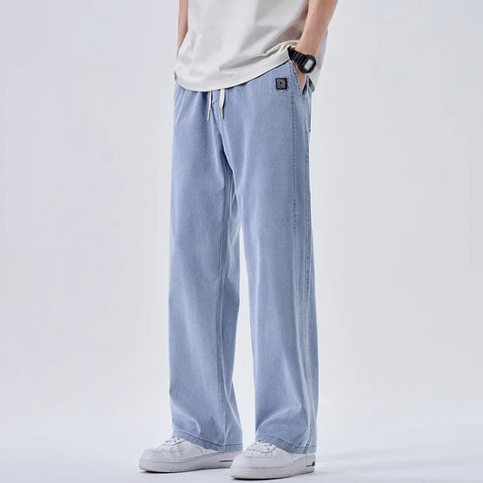 Pantalones vaqueros suaves de marca para hombre, de primavera, finos, drapeados, cómodos, rectos, con cordón, holgados, estilo urbano 