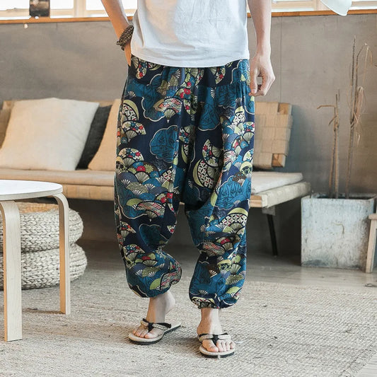 Pantalones harén vintage con estilo para hombre, diseño de entrepierna caída, pantalones casuales, pantalones bohemios holgados y transpirables, pantalones deportivos con estampado aleatorio 